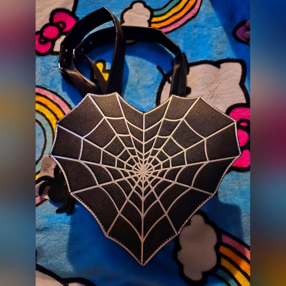Heart shaped spiderweb backpack purse! 🖤